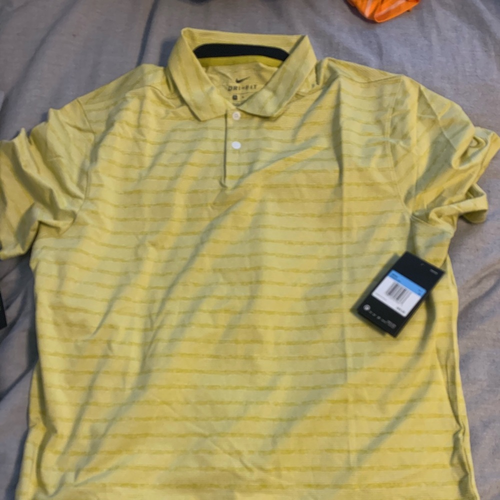 BRAND NEW 2019 Nike Golf polo. Medium.